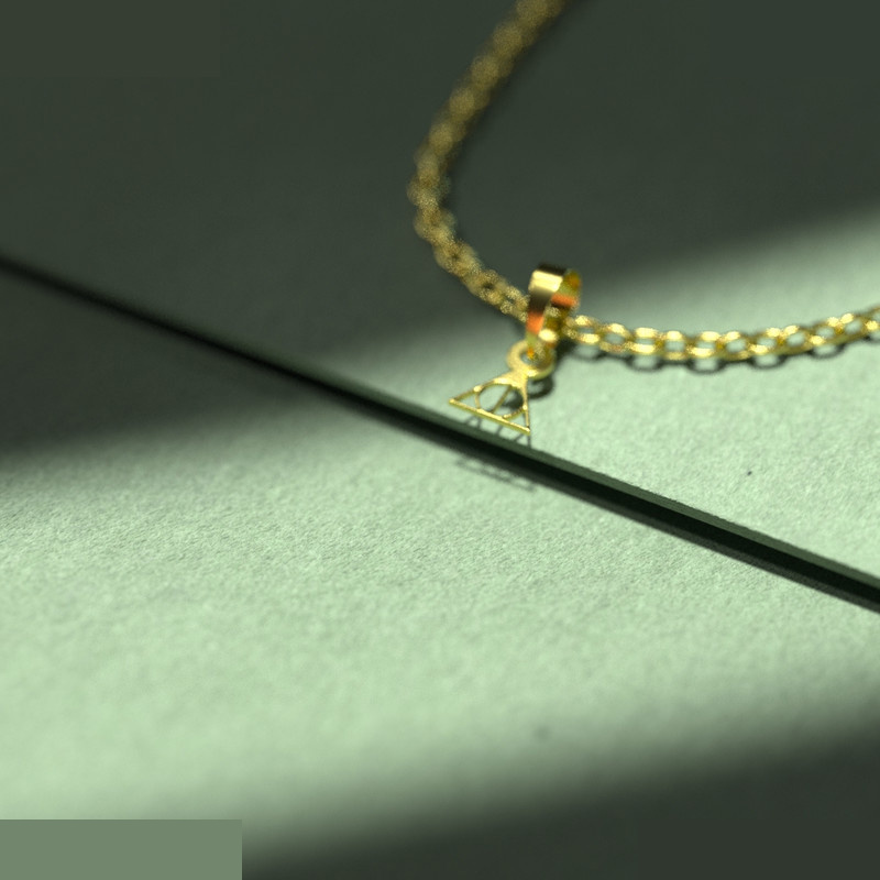 گردنبند طلا 18 عیار زنانه مدوپد مدل هری پاتر کد A3-1-1098 گردنبند طلا 18 عیار زنانه مدوپد مدل هری پاتر کد A3-1-1098