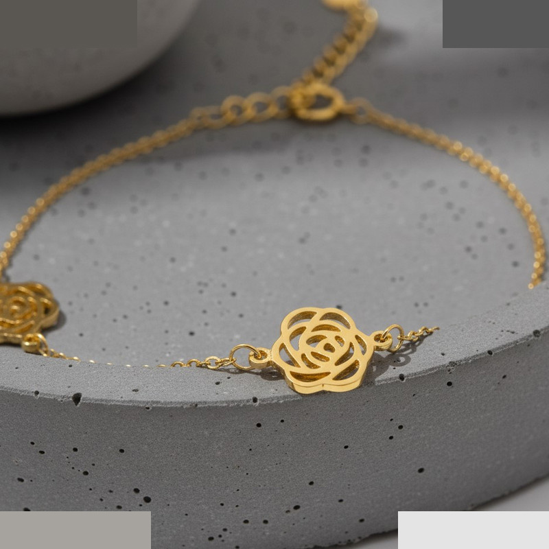 دستبند زنجیری طلا 18 عیار زنانه گالری قو طلایی مدل  سه گل رز مجزا