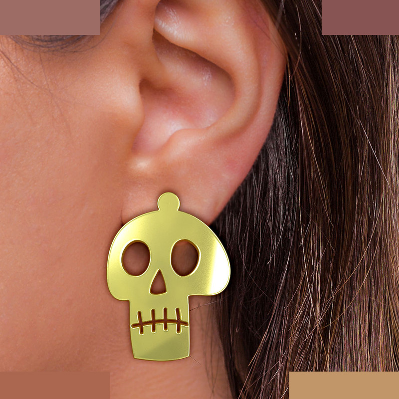 نیم ست طلا 18 عیار زنانه مدوپد مدل جمجمه کد NA15707 نیم ست طلا 18 عیار زنانه مدوپد مدل جمجمه کد NA15707