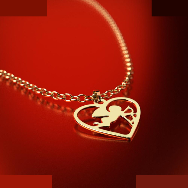 نیم ست طلا 18 عیار زنانه مدوپد مدل قلب و فرشته کد NA11063 نیم ست طلا 18 عیار زنانه مدوپد مدل قلب و فرشته کد NA11063