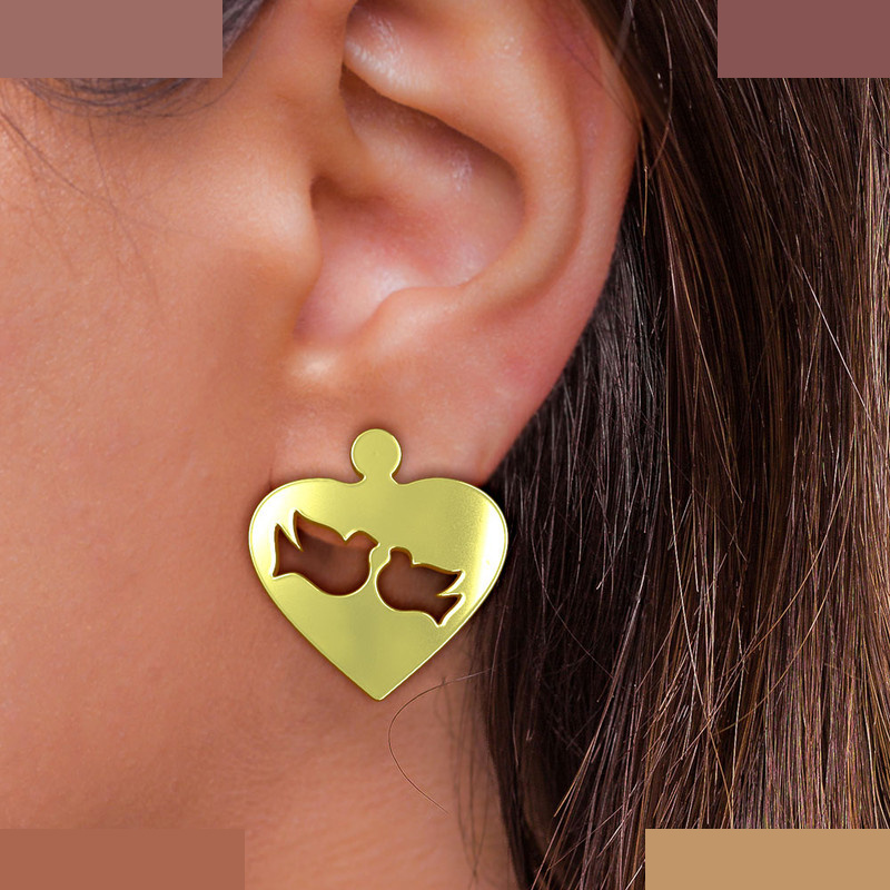 گوشواره طلا 18 عیار زنانه مدوپد مدل قلب و پرنده کد GA1-11018 گوشواره طلا 18 عیار زنانه مدوپد مدل قلب و پرنده کد GA1-11018