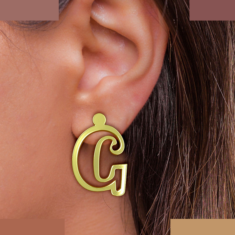 گوشواره طلا 18 عیار زنانه مدوپد مدل حرف G کد GA1-16687 گوشواره طلا 18 عیار زنانه مدوپد مدل حرف G کد GA1-16687