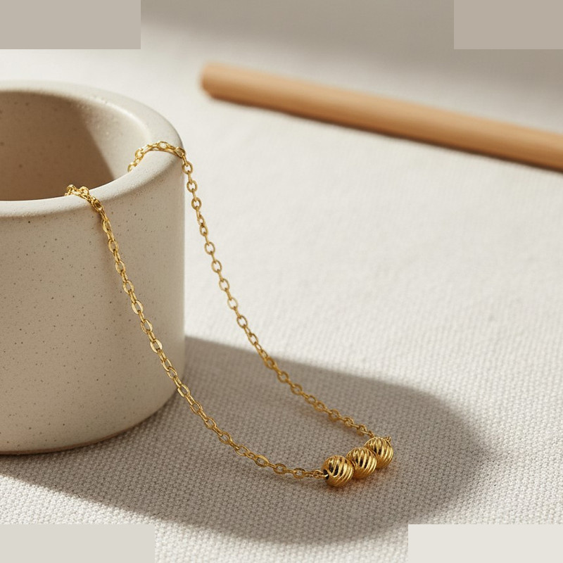 گردنبند طلا 18 عیار زنانه با زنجیر حلقهای (فلامینگو) گالری قو طلایی مدل سه گوی البرنادو گردنبند طلا 18 عیار زنانه با زنجیر حلقهای (فلامینگو) گالری قو طلایی مدل سه گوی البرنادو