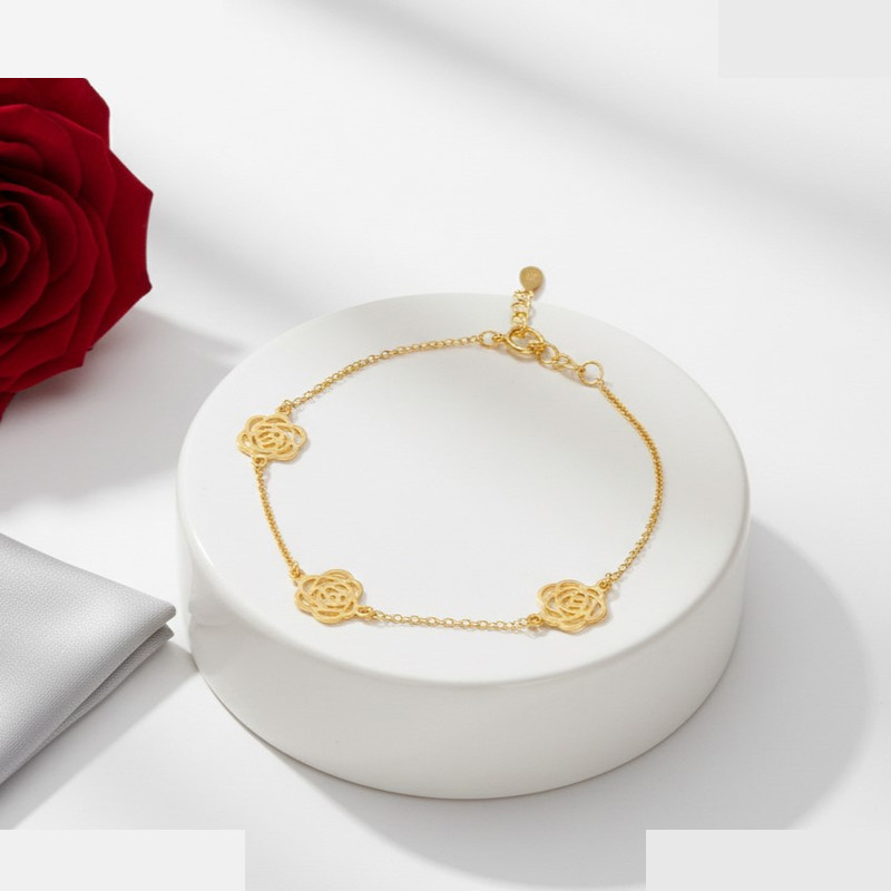 دستبند زنجیری طلا 18 عیار زنانه گالری قو طلایی مدل  سه گل رز مجزا