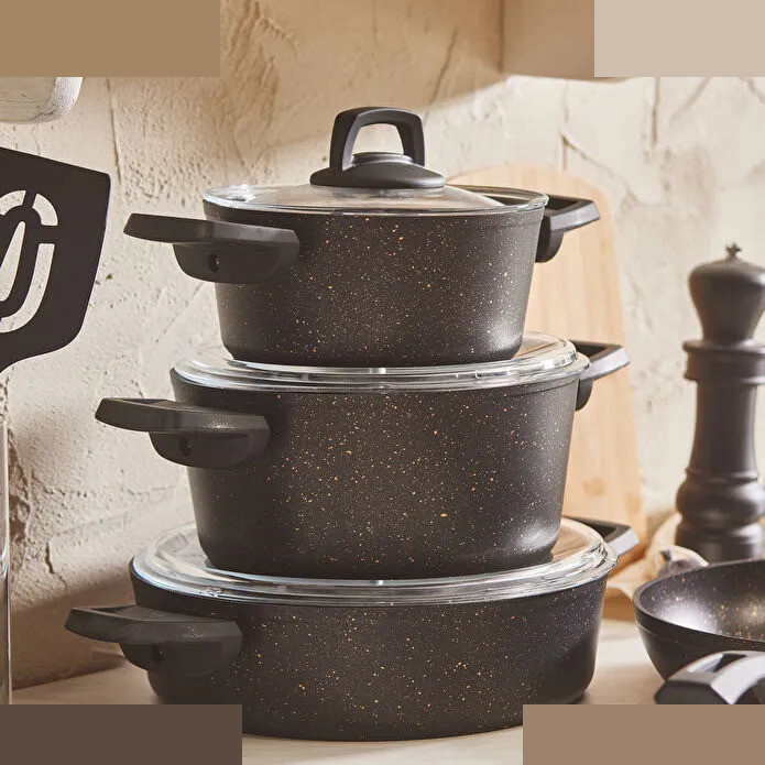 سرویس قابلمه وتابه بیوگرانیتی 13 پارچه کاراجا مدل Black Gold همراه با ابزار آشپزی سرویس قابلمه وتابه بیوگرانیتی 13 پارچه کاراجا مدل Black Gold همراه با ابزار آشپزی