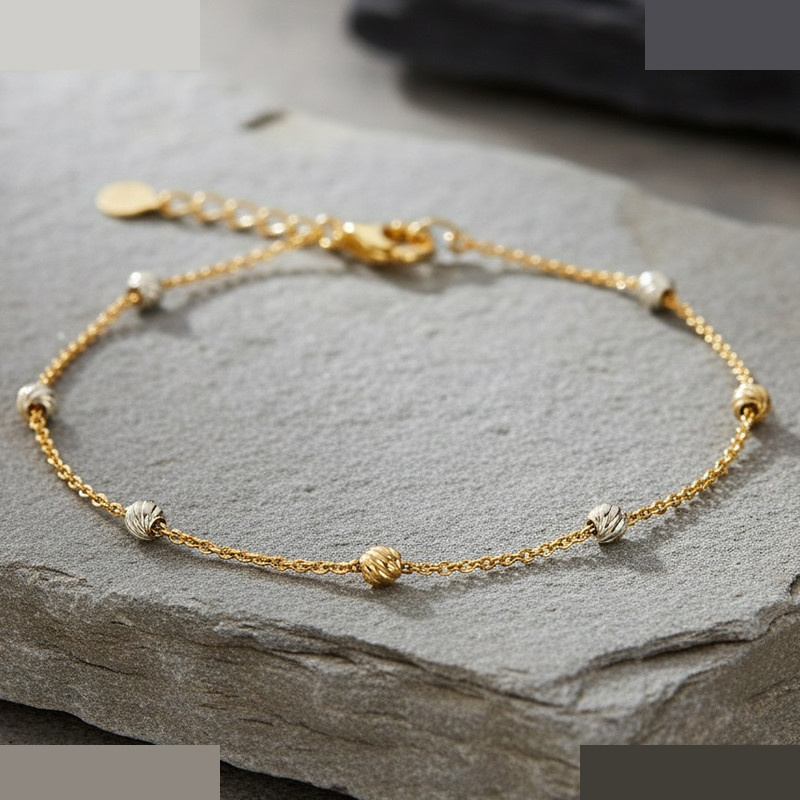 دستبند زنجیری طلا 18 عیار زنانه گالری قو طلایی مدل گوی البرنادو