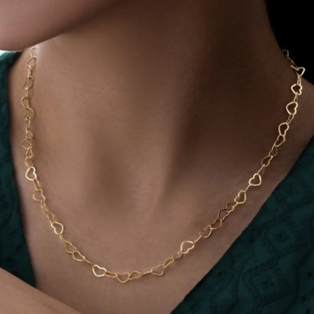 نیم ست طلای 18 عیار زنانه گردنبند دستبند قلبی کد 419