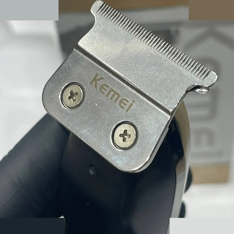 ماشین اصلاح موی سر و صورت شارژی کیمی مدل KM-1571 ماشین اصلاح موی سر و صورت شارژی کیمی مدل KM-1571