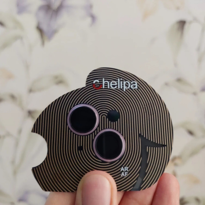 محافظ لنز دوربین شیشه ای اوجی مدل chelipa titanium مناسب برای گوشی موبایل  اپل iPhone 15