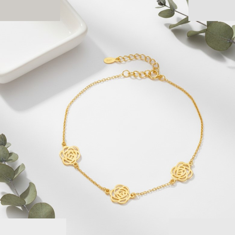 دستبند زنجیری طلا 18 عیار زنانه گالری قو طلایی مدل  سه گل رز مجزا