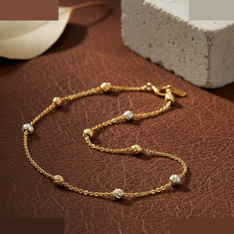 دستبند زنجیری طلا 18 عیار زنانه گالری قو طلایی مدل گوی البرنادو