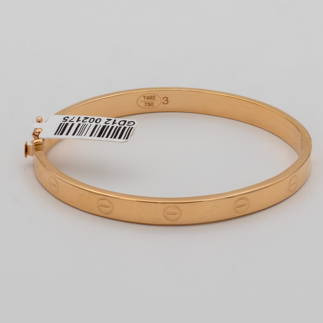 دستبند طلا گالری طلا عرفان زنانه مدل کارتیه پیچ زرد کد 3027 دستبند طلا گالری طلا عرفان زنانه مدل کارتیه پیچ زرد کد 3027
